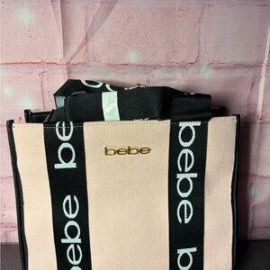 bebe Blush Canvas Tote with Black Logo Straps and Gold Plaque